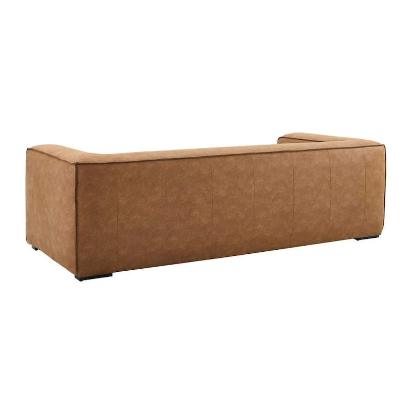 Nowoczesna sofa ze skóry i innych materiałów w kolorze brązowym, niskoprofilowa, z głębokim siedziskiem, szerokość 228,1 cm
