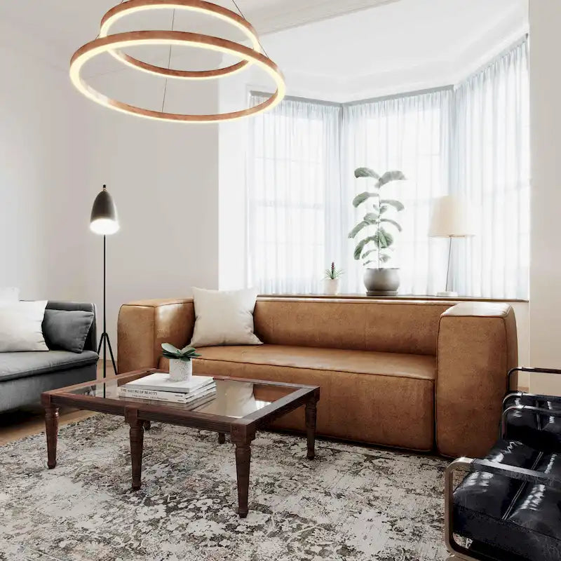 Nowoczesna sofa ze skóry i innych materiałów w kolorze brązowym, niskoprofilowa, z głębokim siedziskiem, szerokość 228,1 cm