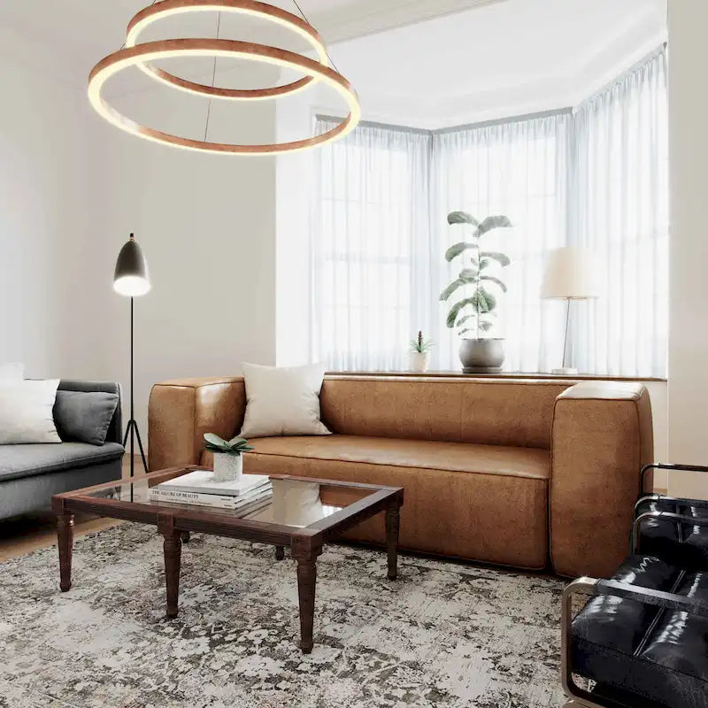 Nowoczesna sofa ze skóry i innych materiałów w kolorze brązowym, niskoprofilowa, z głębokim siedziskiem, szerokość 228,1 cm